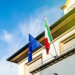 EU and Italian flags on embassy building