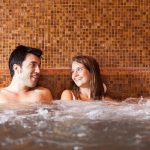 Couple doing a whirlpool bath in a spa